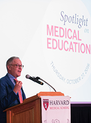 Neal Baer speaking at a podium